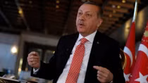 Erdogan says Turkey won't wait at Europe's door forever