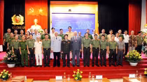 Public security officers graduating former Soviet Union or Russia training facilities meet with Russian Minister of the Interior