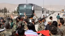 Thousands more leave enclave in Syria's Ghouta as Assad takes back control