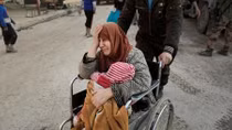 Iraqi forces fight IS in Mosul as bomb blasts hit Tikrit wedding