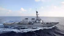 U.S. Navy ship fired warning shots at Iranian vessels