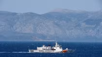 NATO nearing solution to continue Aegean migrant mission: UK general