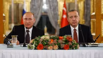 Russia and Turkey sign gas deal, seek common ground on Syria as ties warm