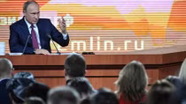 Putin says U.S. gripped by fabricated spymania, praises Trump