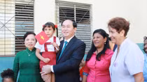 President visits school, monuments in Havana