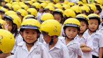 Traffic police force offer students vouchers to buy standard helmets