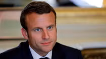 Macron's likely landslide lifts markets, low turnout clouds celebration