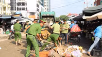 Police force helps people clean up after historic rain