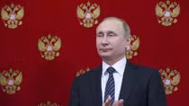 Putin says Russian, U.S. intelligence agencies should restore ties