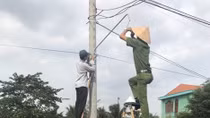 Young police officers light up rural roads in Tien Giang province