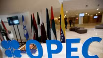 OPEC agrees modest oil output curbs in first deal since 2008