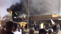 U.S. Embassy evacuated as violent Baghdad protesters denounce air strikes