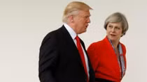 May, Trump agree Russia should break ties with Assad