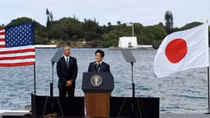In Pearl Harbor visit, Abe pledges Japan will never wage war again