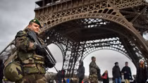 French President Emmanuel Macron signs controversial anti-terror law