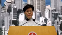 Bowing to pressure, Hong Kong leader suspends extradition bill