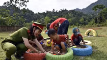 Young police officers create playground for children in mountainous areas