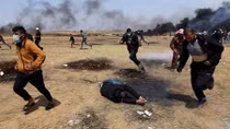 Three dead and hundreds injured as Israeli troops open fire on Gaza border