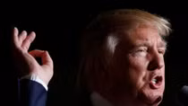 Trump attacks Clinton on trade, says he should be handed victory