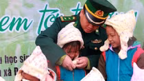 Border guards bring warmth to mountainous students