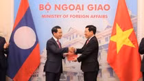 Vietnam, Laos exchange two import legal documents on border issues