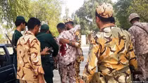 Gunmen kill 25, including 12 Revolutionary Guards, in attack on Iran military parade