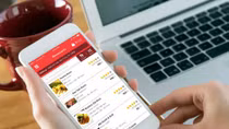 A green-red rivalry heats up food delivery market