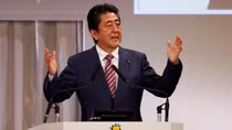 Japan PM Abe's woes deepen as ratings drop, predecessor predicts resignation