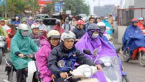 Hanoi people in the first cold snap of winter 