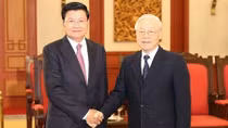 Top Vietnamese leader welcomes Lao Prime Minister