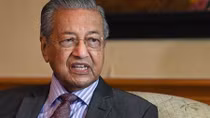Malaysia’s interim PM proposes forming unity government