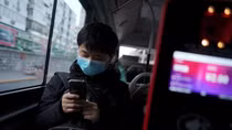 New coronavirus cases fall in China but fears grow over global spread