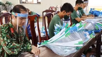 Troops produce 5,000 face shields to support Laos people amid COVID-19 