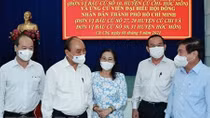 State President holds working session with Cu Chi, Hoc Mon districts in HCM City