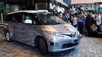  Driverless taxi debuts in Tokyo in 'world first' trial ahead of Olympics