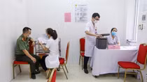 Public security officers get vaccinated against COVID-19