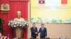 Minister Luong Tam Quang holds talks with Lao Minister of Public Security