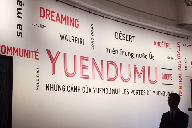 The exhibition features 15 of 30 doors painted by Warlpiri elders at the Yuendumu community school. They represent Warlpiri people's very first experiment with acrylic paint - a western art medium - to detail their daily lives and their dreaming - the aboriginal belief system about the creation of the world.