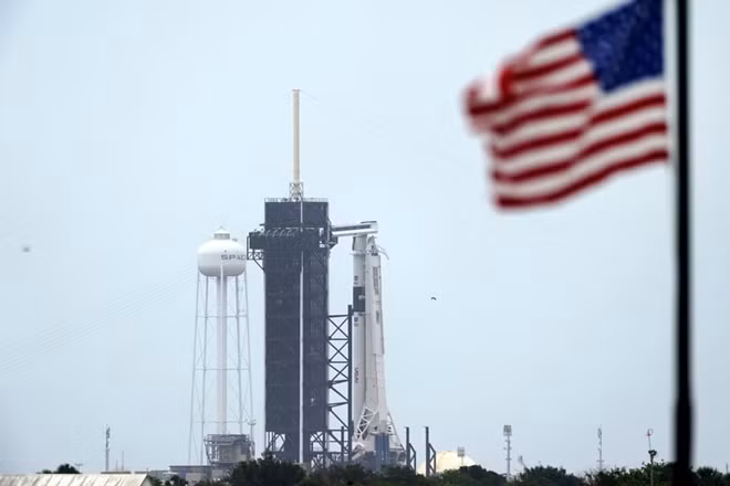 The SpaceX Falcon 9, with the Crew Dragon spacecraft on top of the rocket, sits on Launch Pad 39-A on Monday at Kennedy Space Center. Photograph: David J Phillip/AP