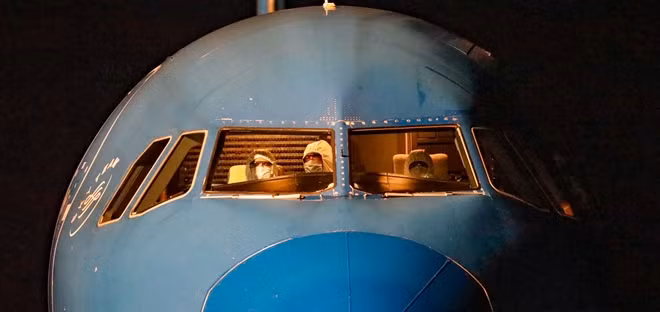 After 30 minutes of health checking, the first passenger finally got off the plane.