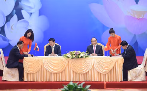 The two PMs at the signing ceremony. The two PMs at the signing ceremony.