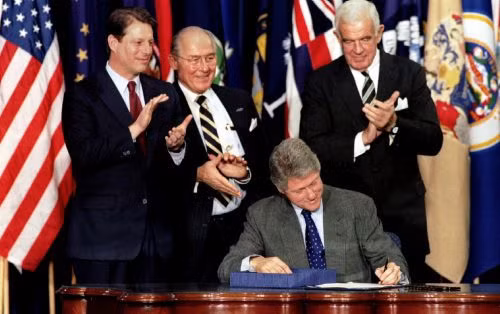 President Clinton signing the North American Free Trade Agreement, December 1993. (Photo: Reuters)