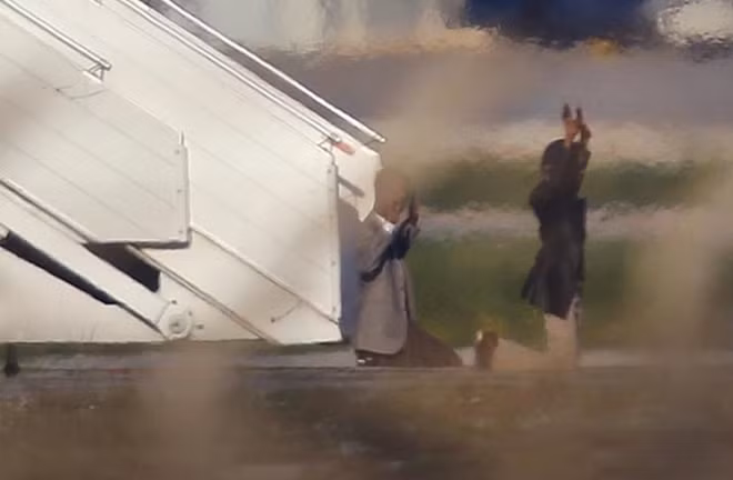 Two hijackers of a Libyan Afriqiyah Airways Airbus A320 surrender to Maltese military on the runway at Malta Airport, December 23, 2016. REUTERS/Darrin Zammit-Lupi