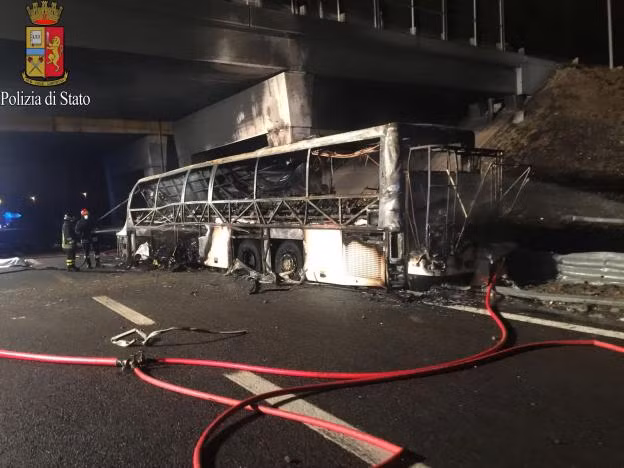 A charred bus, which was carrying Hungarian students, is seen on a side of a highway, near Verona, northern Italy, January 21, 2017. Italian Police/Handout via REUTERS A charred bus, which was carrying Hungarian students, is seen on a side of a highway, near Verona, northern Italy, January 21, 2017. Italian Police/Handout via REUTERS