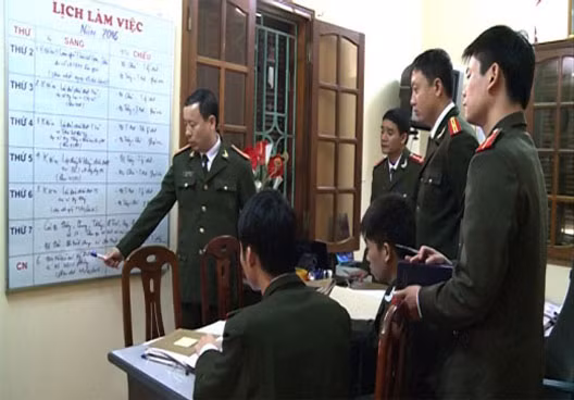 Police officers at a daily meeting.