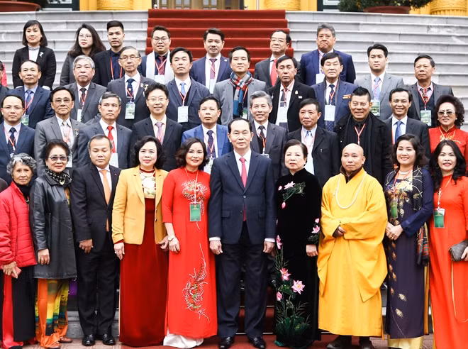 President Tran Dai Quang and the delegation of overseas Vietnamese.