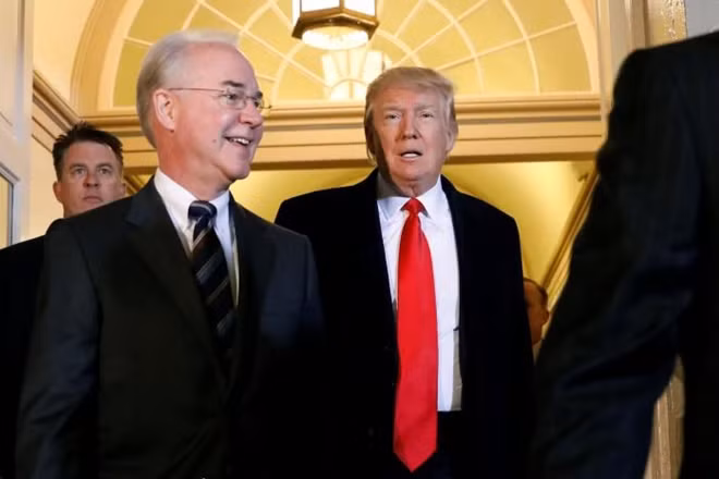 U.S. President Donald Trump (C) and Health and Human Services Secretary Tom Price (L) enter the U.S. Capitol in Washington, U.S., March 21, 2017. REUTERS/Kevin Lamarque