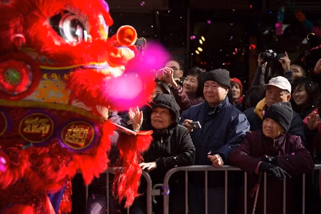 People celebrate the 2017 Lunar New Year - Year of the Rooster in China Town, NY City. Photo: NYT