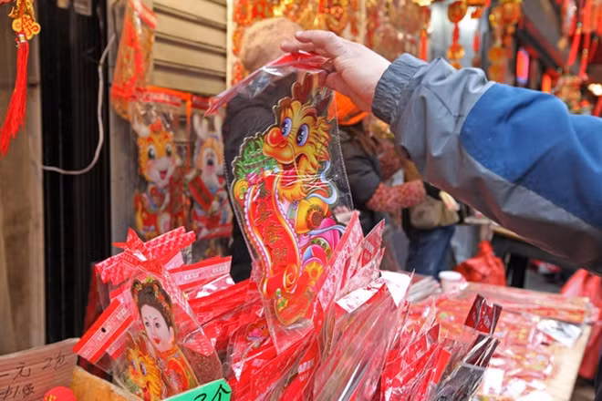 People celebrate the 2017 Lunar New Year - Year of the Rooster in China Town, NY City. Photo: NYT