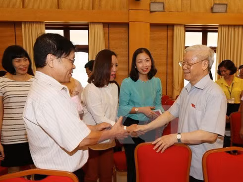 Party General Secretary Nguyen Phu Trong meets voters in Hanoi.